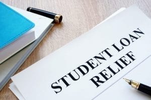 Student loan debt relief paperwork on desk
